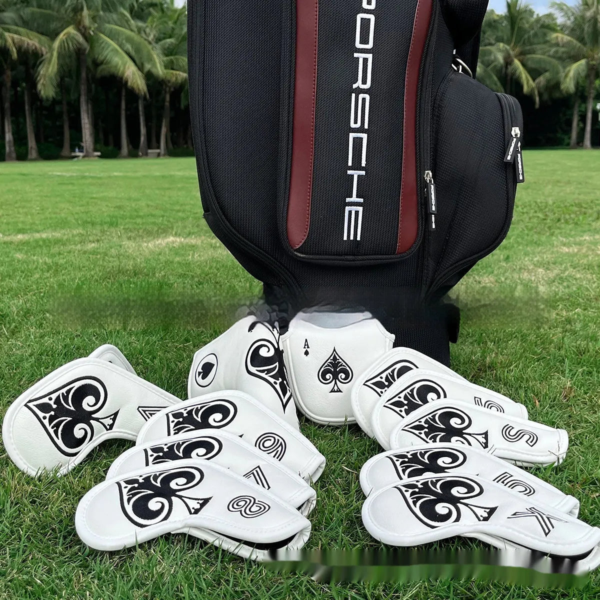 A PU golf putter sleeve in one of three colours, designed to cover a putter head and shaft.