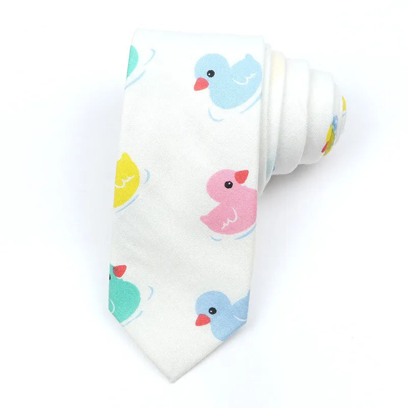 Narrow Korean-style cotton bow tie featuring a colourful cartoon print pattern.