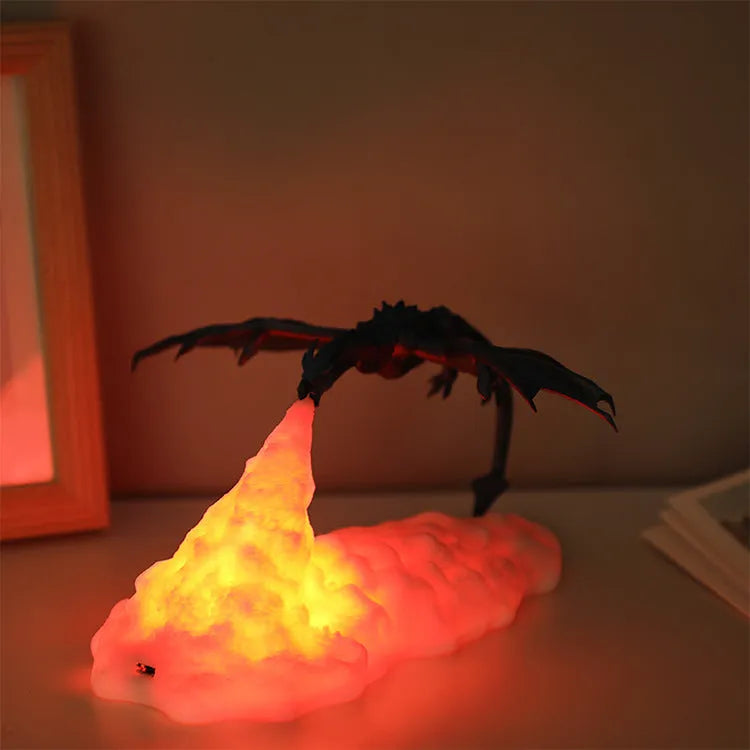 3D printed red dragon lamp lit up with warm glow on a dark surface
