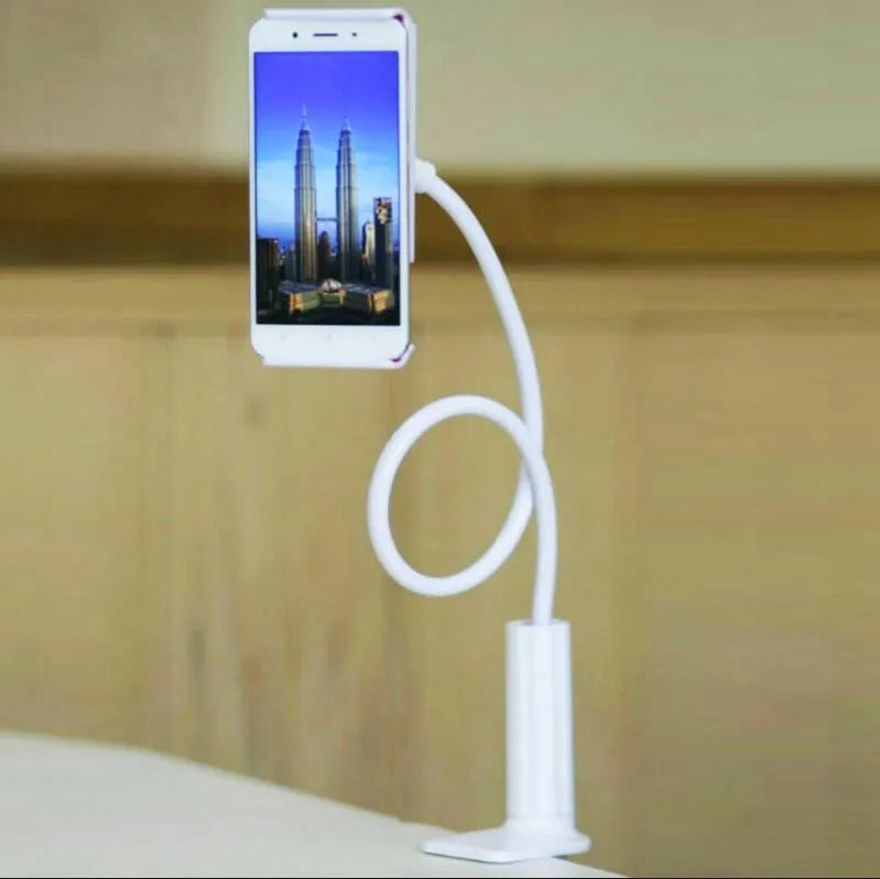 Black aluminium alloy bedside phone stand with a long flexible arm holding a mobile phone on a table.