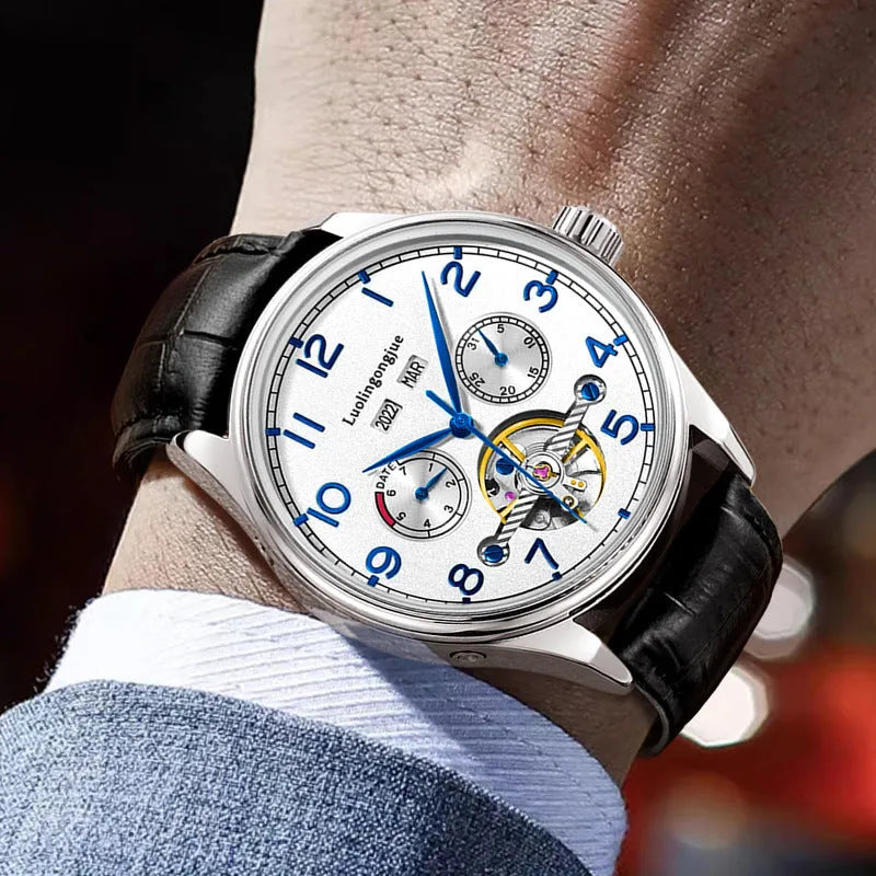 Men's stainless steel mechanical watch with sapphire crystal and leather strap on wrist