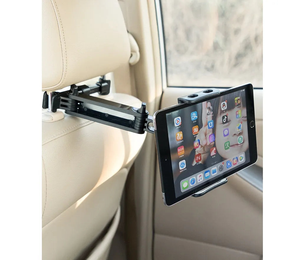 Black plastic universal car phone holder mounted on a car rear seat base.