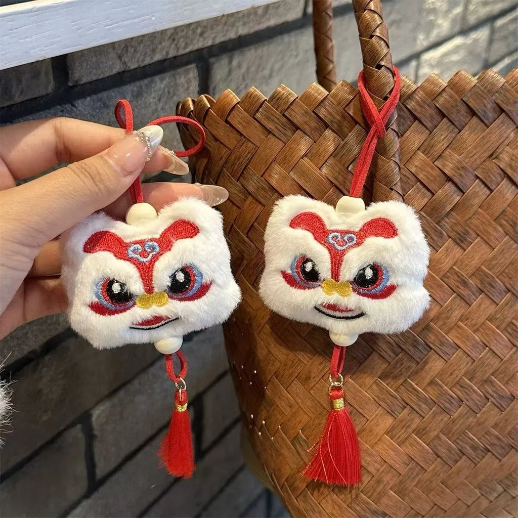 Blue and yellow handmade plush lion tassel ornament keychain with star stone decorative details