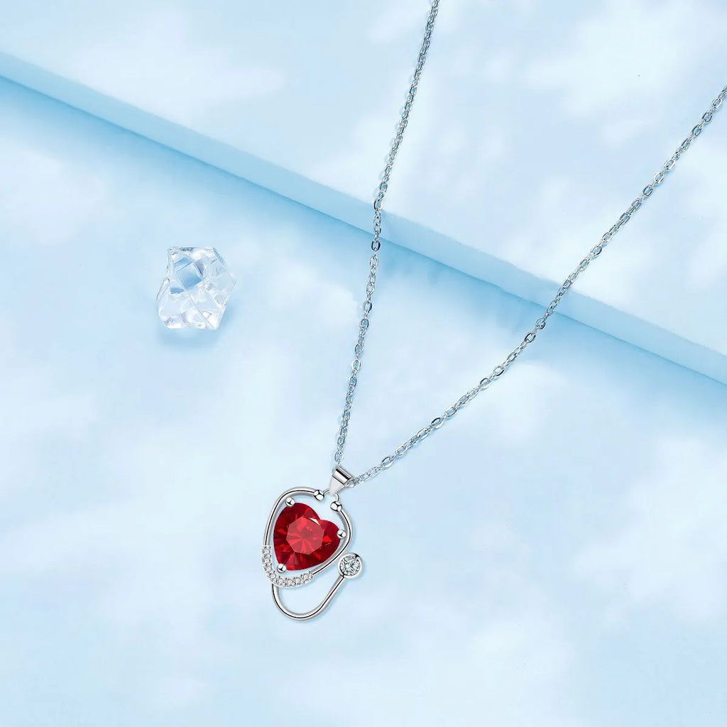 Red diamond wings cross stethoscope necklace for women, made from electroplated copper.