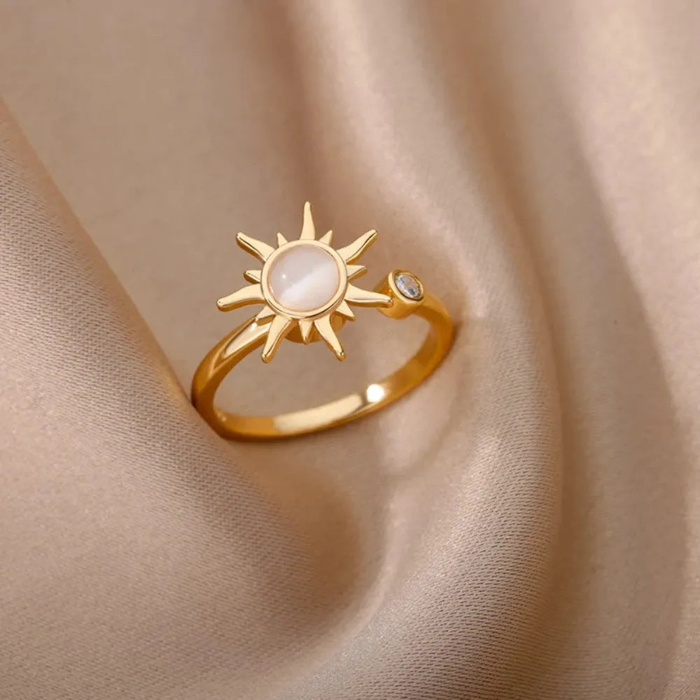 Gold and platinum electroplated copper decompression ring with rotatable design and adjustable opening
