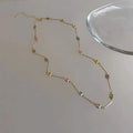 Square geometric clavicle chain necklace in gold or white K tone with alloy and artificial crystal.