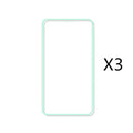 Luminous tempered glass screen protector glowing in the dark next to an iPhone.