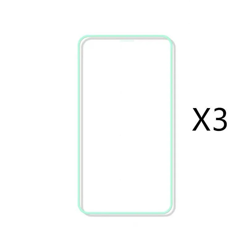 Luminous tempered glass screen protector glowing in the dark next to an iPhone.