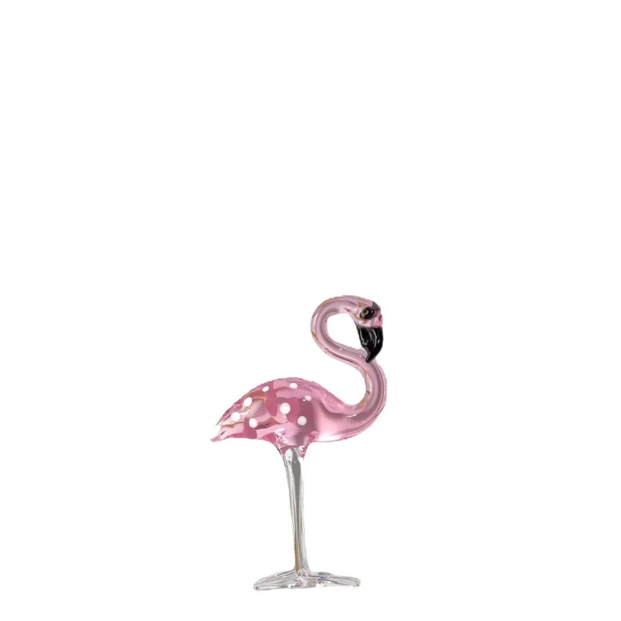 Pink flamingo crystal animal decoration on a tabletop in separate and juxtaposition styles.