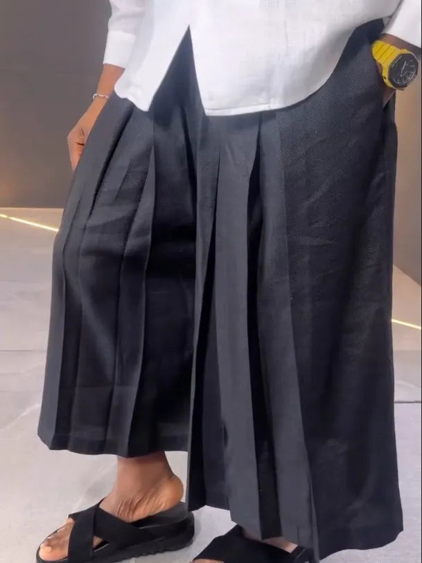 White asymmetric front long sleeve shirt with black pleated trousers casual set