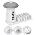 White mushroom-shaped LED lamp and 5-port USB charging dock station on a wooden desk.