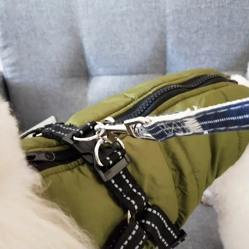Waterproof dog coat in red with harness opening, sized for Labrador breed during winter walk.