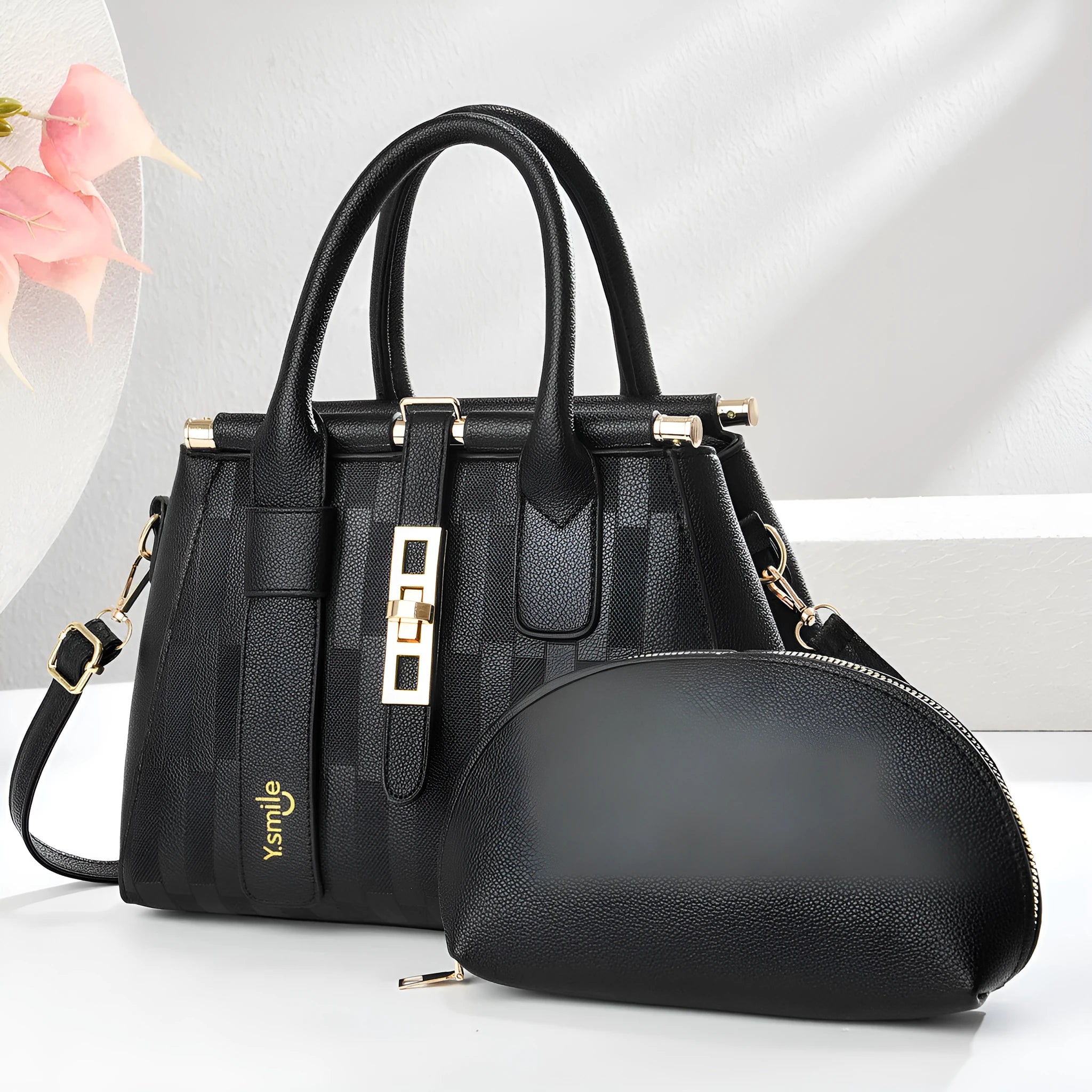 Round PU leather crossbody shoulder bag in black, shown with adjustable strap and measuring 28cm wide.