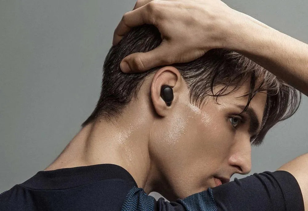 Redmi AirDots 2 black true wireless earbuds with charging case on a white background