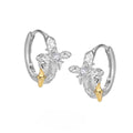 925 sterling silver geometric cross earrings with white gold colour finish and round design elements