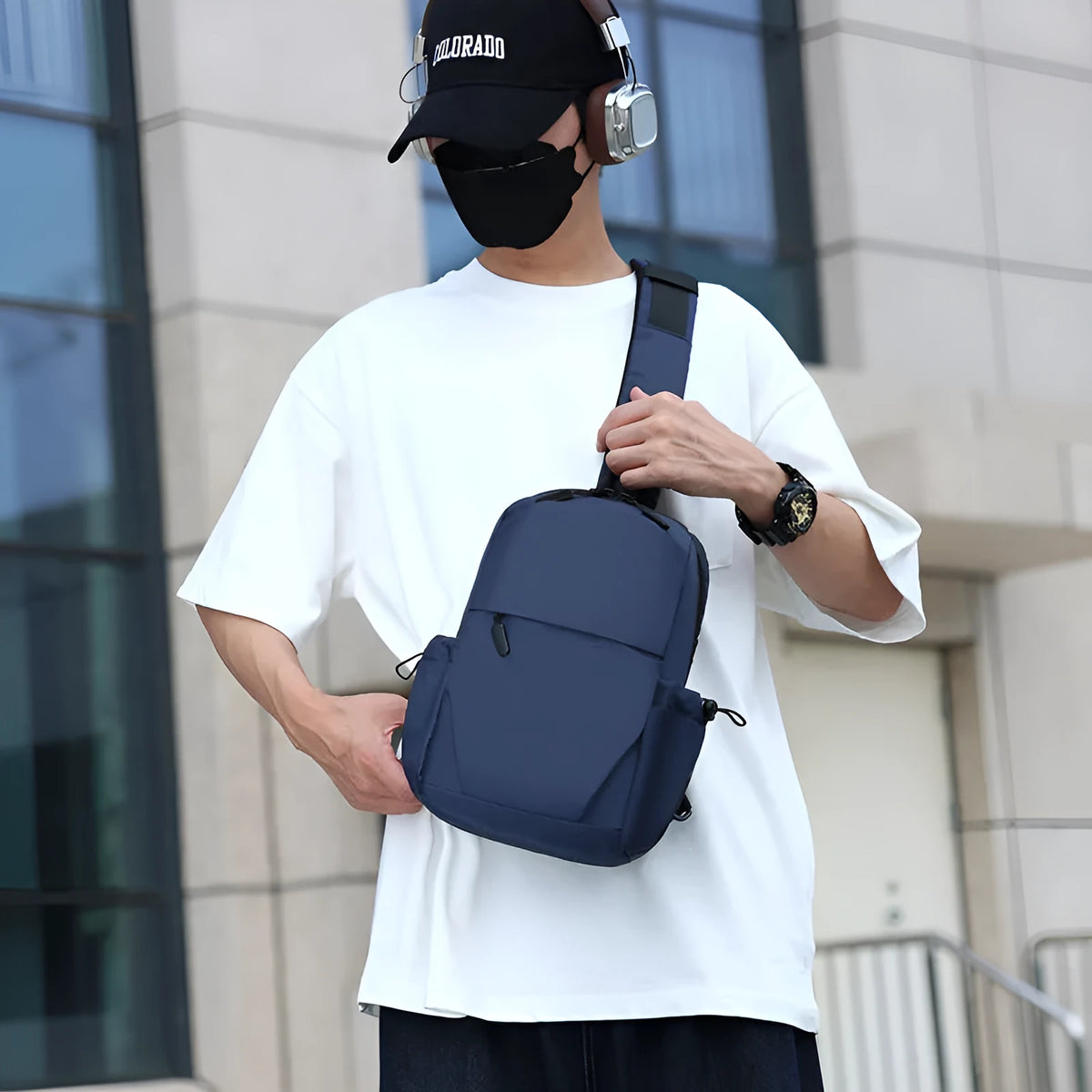 Men's grey waterproof chest bag showing front compartment with 33cm height measurement