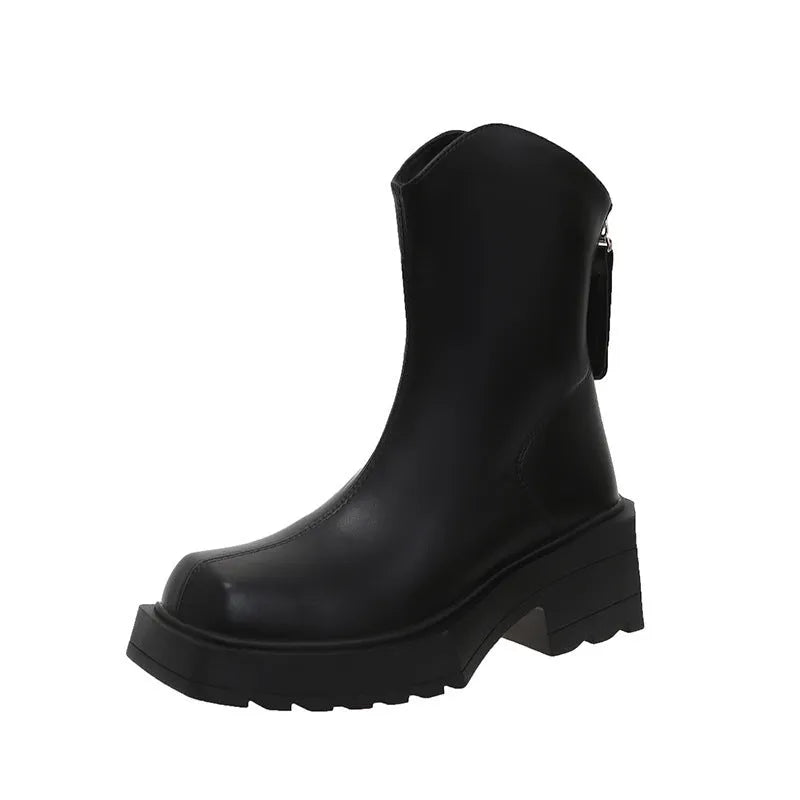 Black square toe platform Martin boots for women with a chunky rubber sole and back zip.
