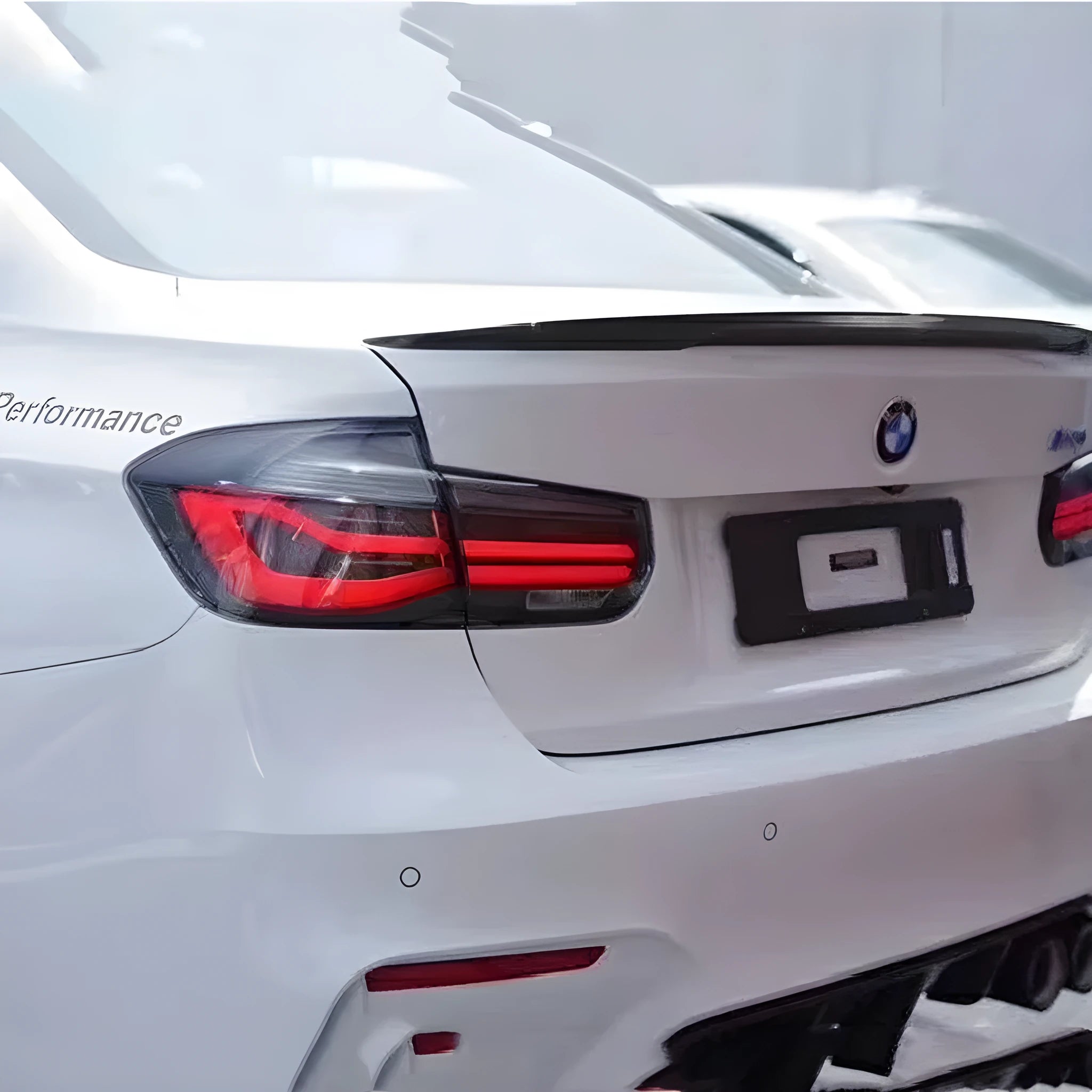 BMW 3 Series tail light assembly with streamer steering LED pattern in red or smoked black options