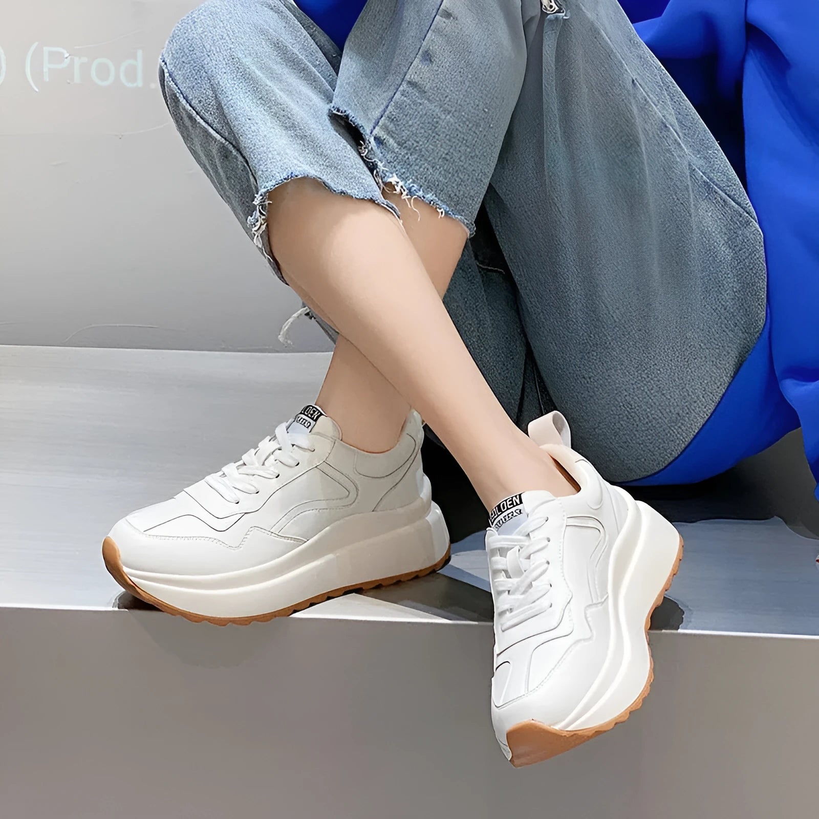 Beige women's cattlehide leather low-top sports shoes with an English muffin heel and cross strap detail