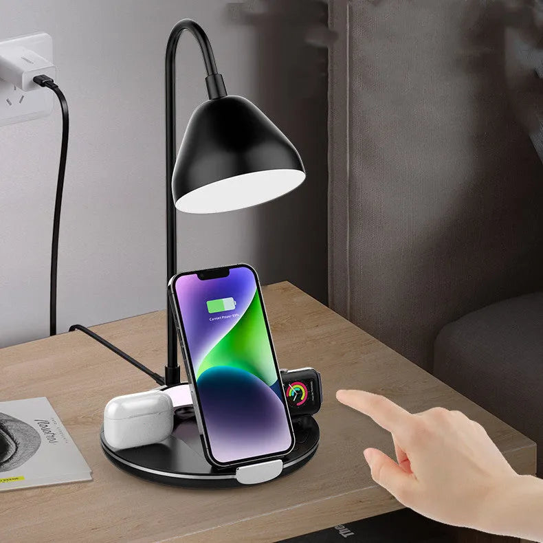 Black folding wireless charger showing magnetic phone attachment and built-in cable storage compartment
