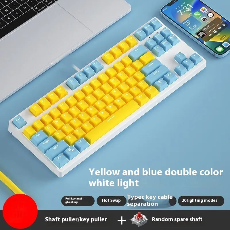 87 key wired mechanical keyboard with metal chassis shown in a black, orange, and yellow colour configuration.