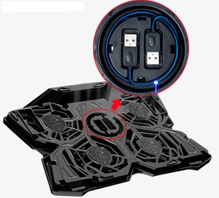 Blue computer cooling base with four LED fans and USB ports on desktop