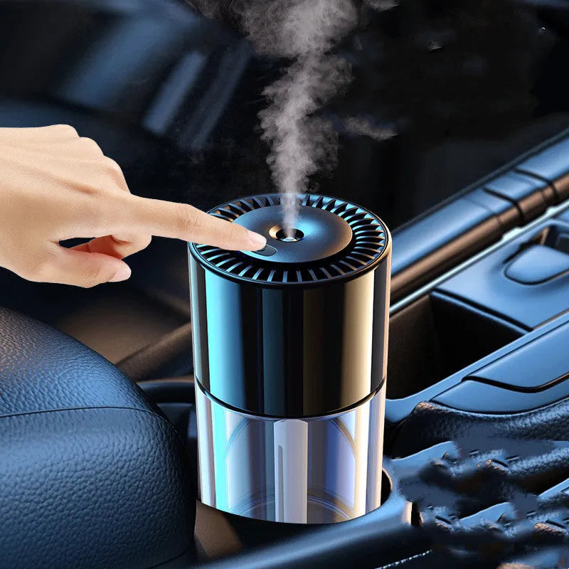 Glass intelligent spray perfume humidifier with USB cable and scent bottle on a desk