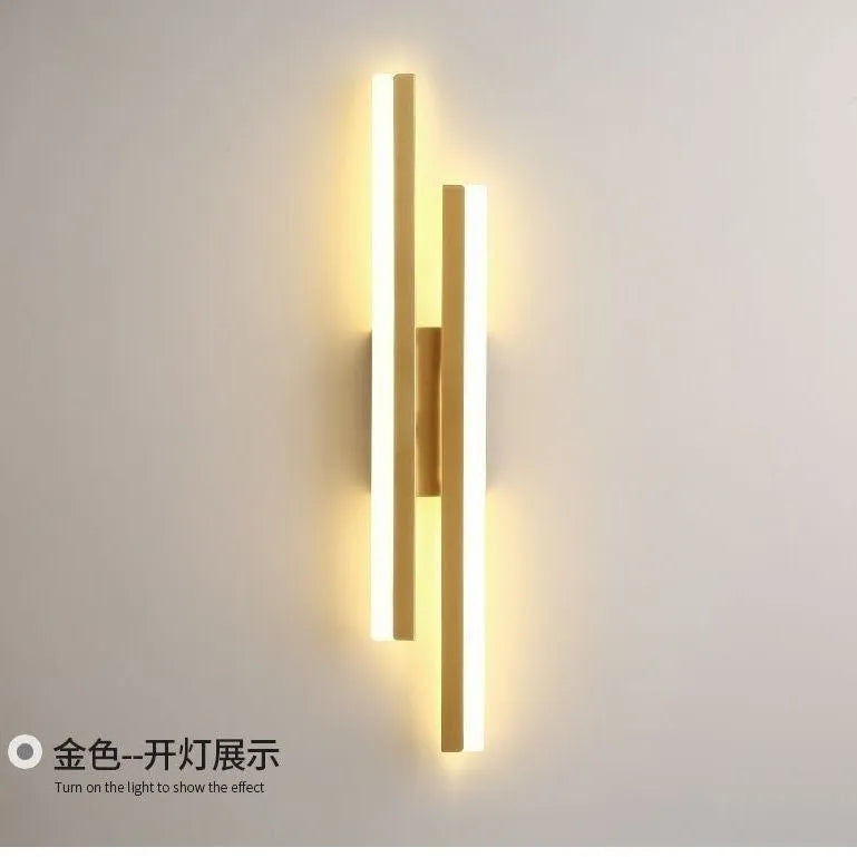Modern minimalist LED wall light with acrylic shade in black or gold finish showing 50cm and 65cm size options
