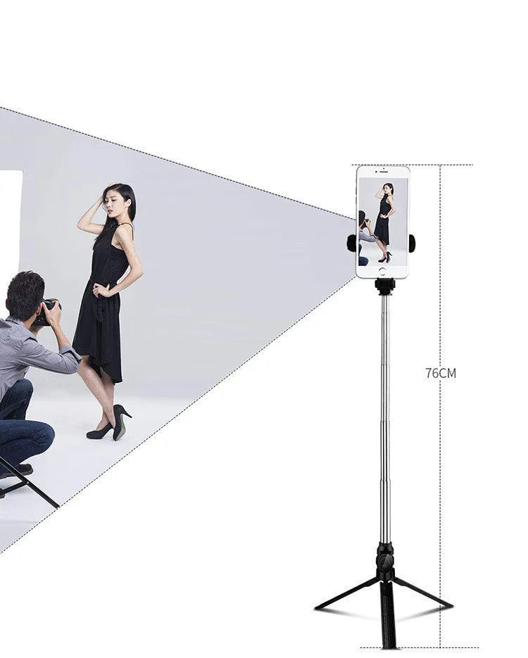 Black Bluetooth selfie stick with extended tripod legs and a phone clip rotated for horizontal filming.