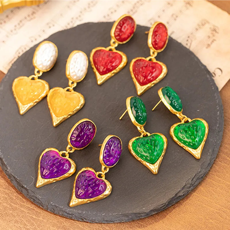 Silver pleated oval love heart stud earrings in alloy, showing green, purple, red, and yellow white colour options.