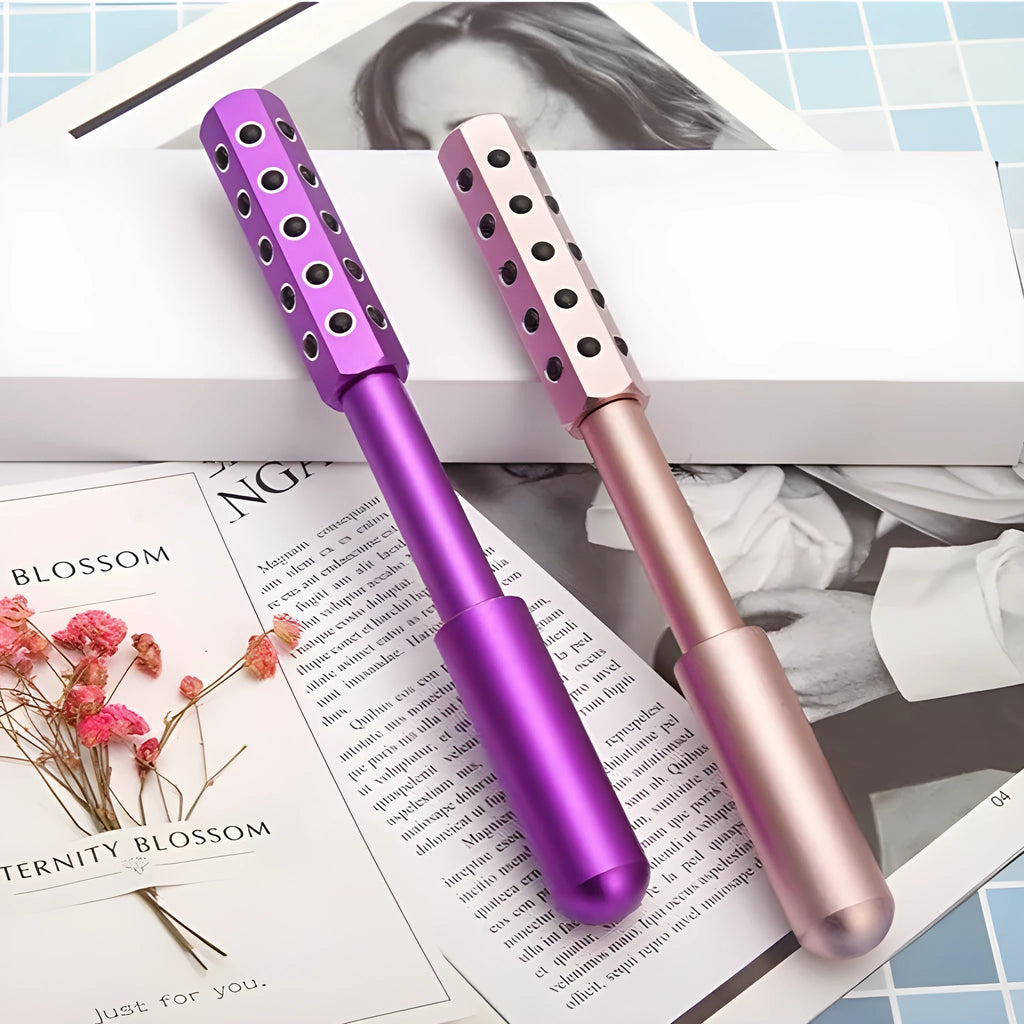Germanium particles roller facial massager in purple colour with metal roller head
