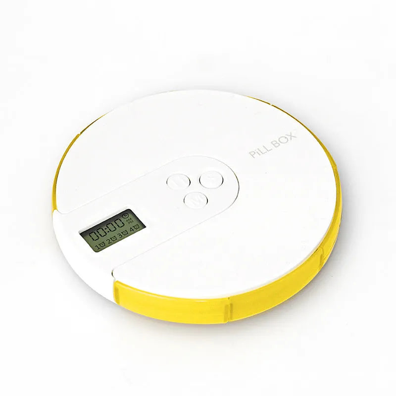Blue 7-compartment alarm clock pill dispenser showing time display and medication slots