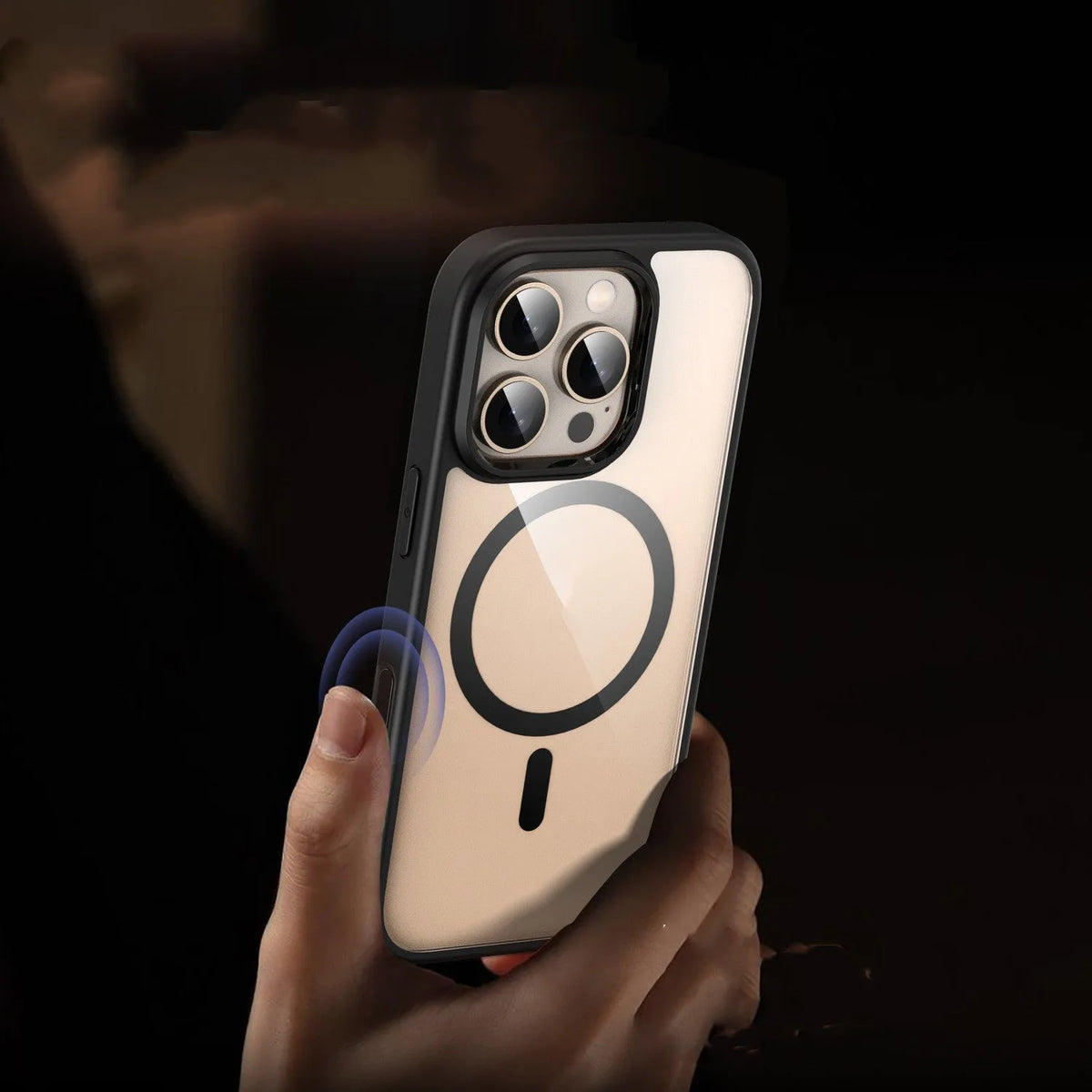 Black transparent magnetic iPhone 16 phone case with airbag drop protection shown on mobile phone
