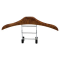 Wood yellow stainless steel car mounted clothes hanger holding a suit jacket on a car seat