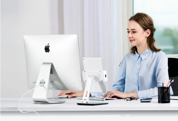 Foldable aluminium desktop phone and tablet holder showing 360° rotation capability