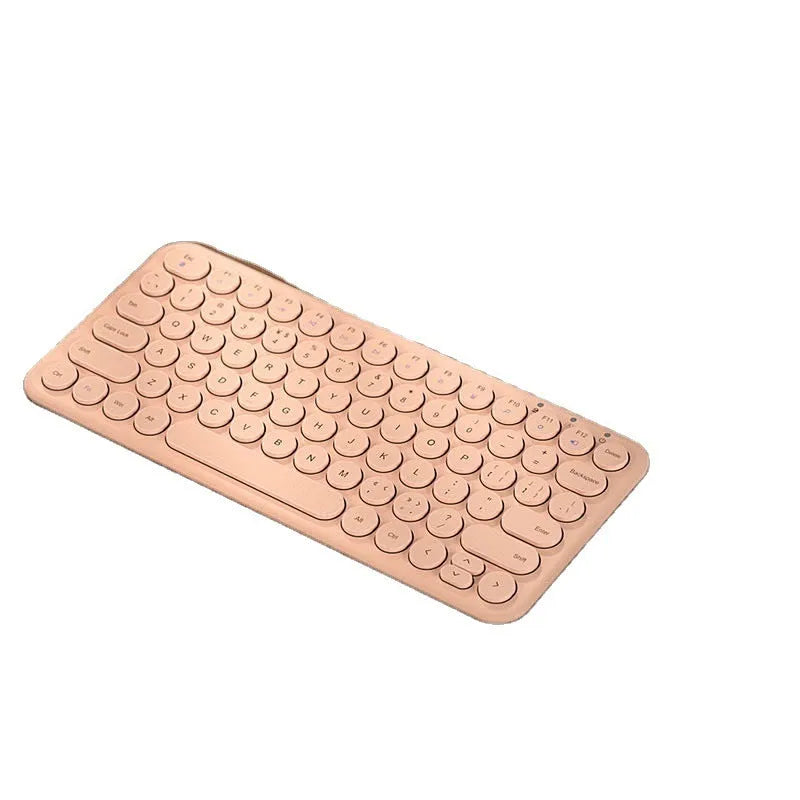 A slim white wireless keyboard and mouse set with a USB receiver on a desk.