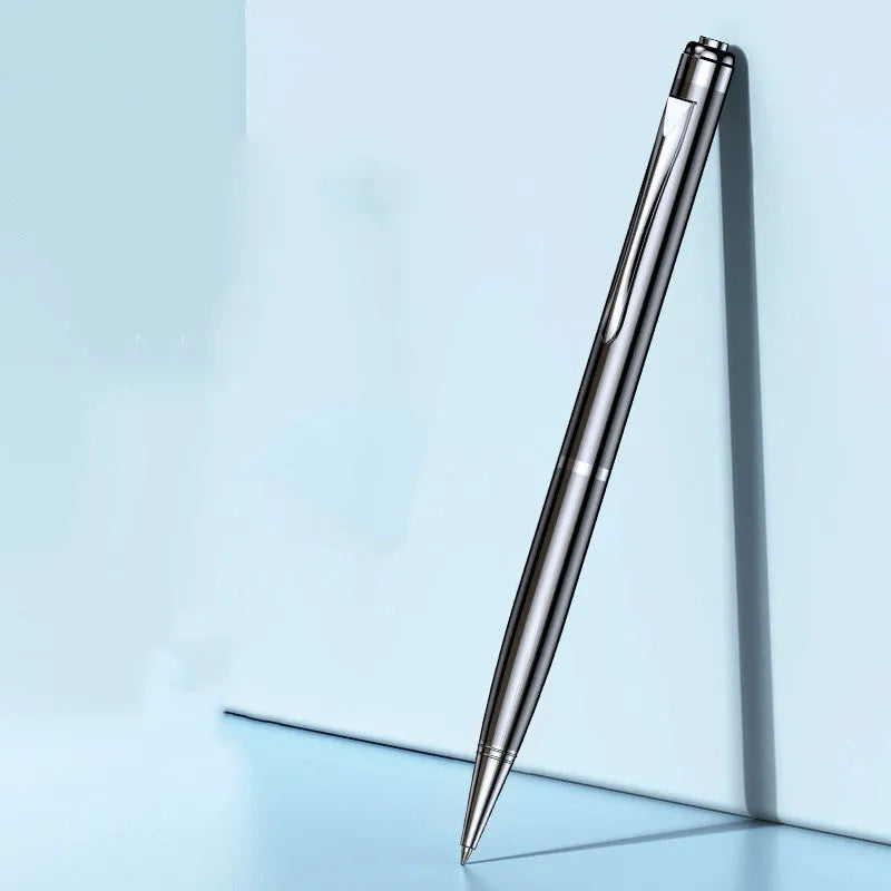 Black pen shaped voice recorder with zinc alloy shell shown alongside included headset and data cable