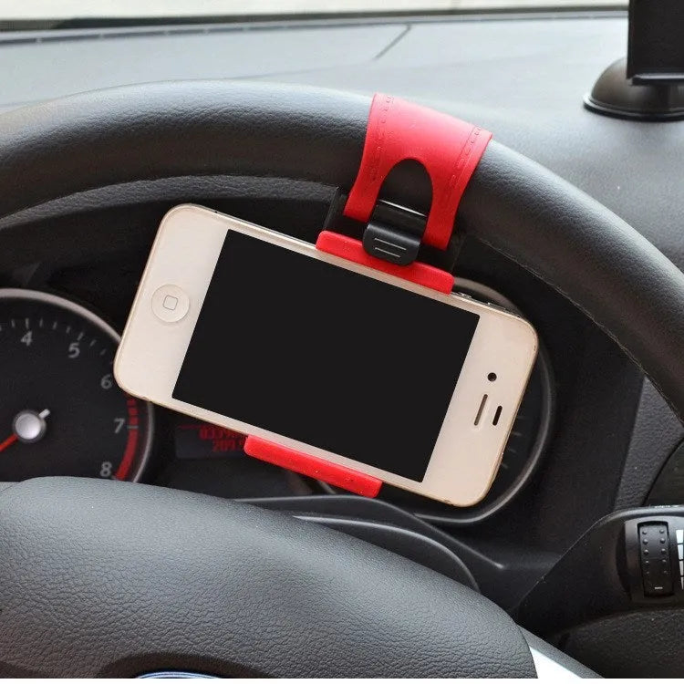 Black steering wheel phone clip mount holder showing adjustable clip and phone placement