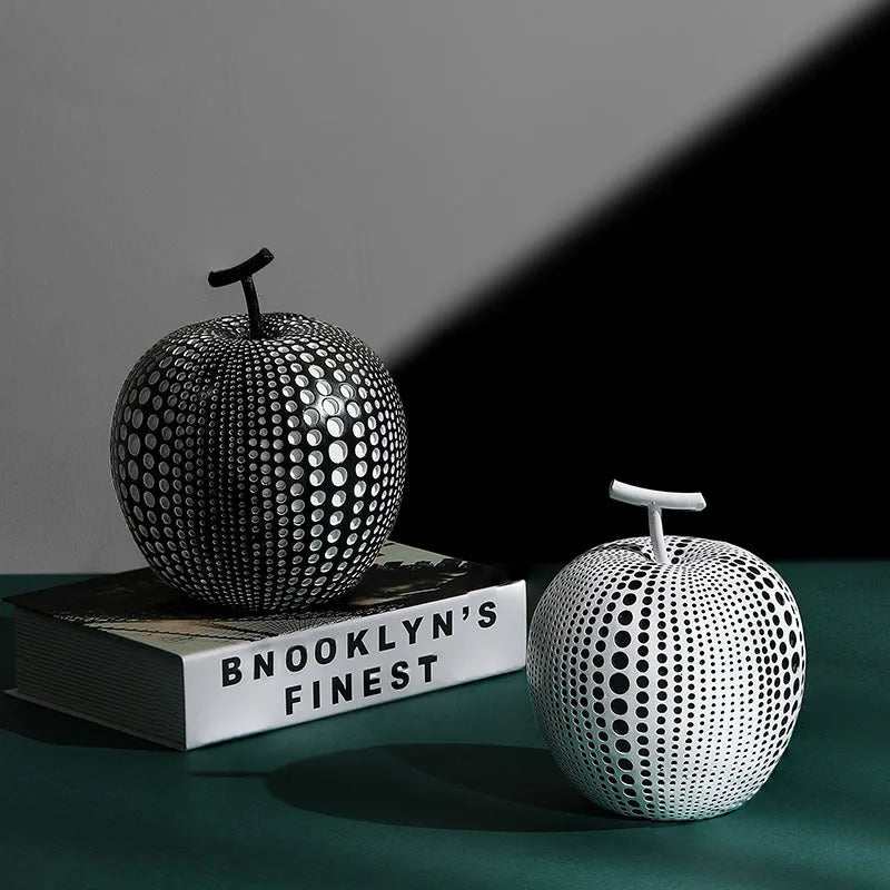 Resin fruit decoration crafts in white, orange, black and blue colour variations showing high and low profile designs