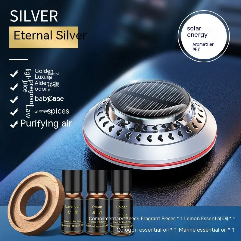 Compact black solar-powered aluminium alloy car air freshener for odour removal on a car dashboard