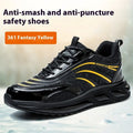 Orange leather labour protection safety shoes with a rubber anti-smashing sole on a grey background