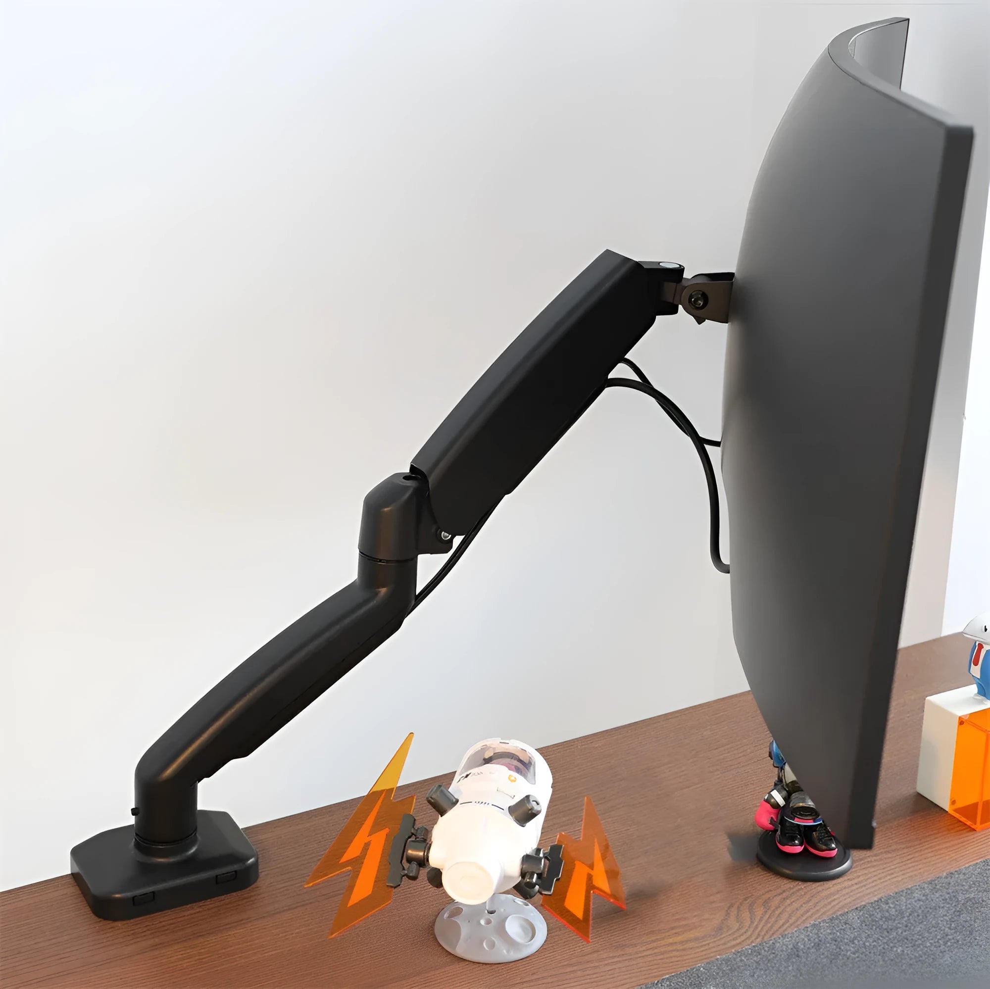 Black rotating telescopic monitor bracket on table with screen adjustment demonstration