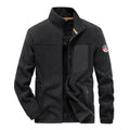 Men's solid colour fleece cardigan jacket with zipper pockets in gray, shown on a model.