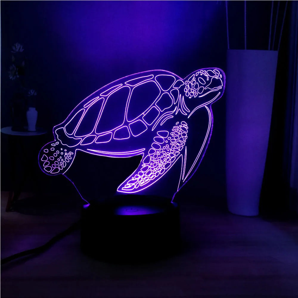 3D acrylic LED turtle night light showing colour-changing glow and remote control