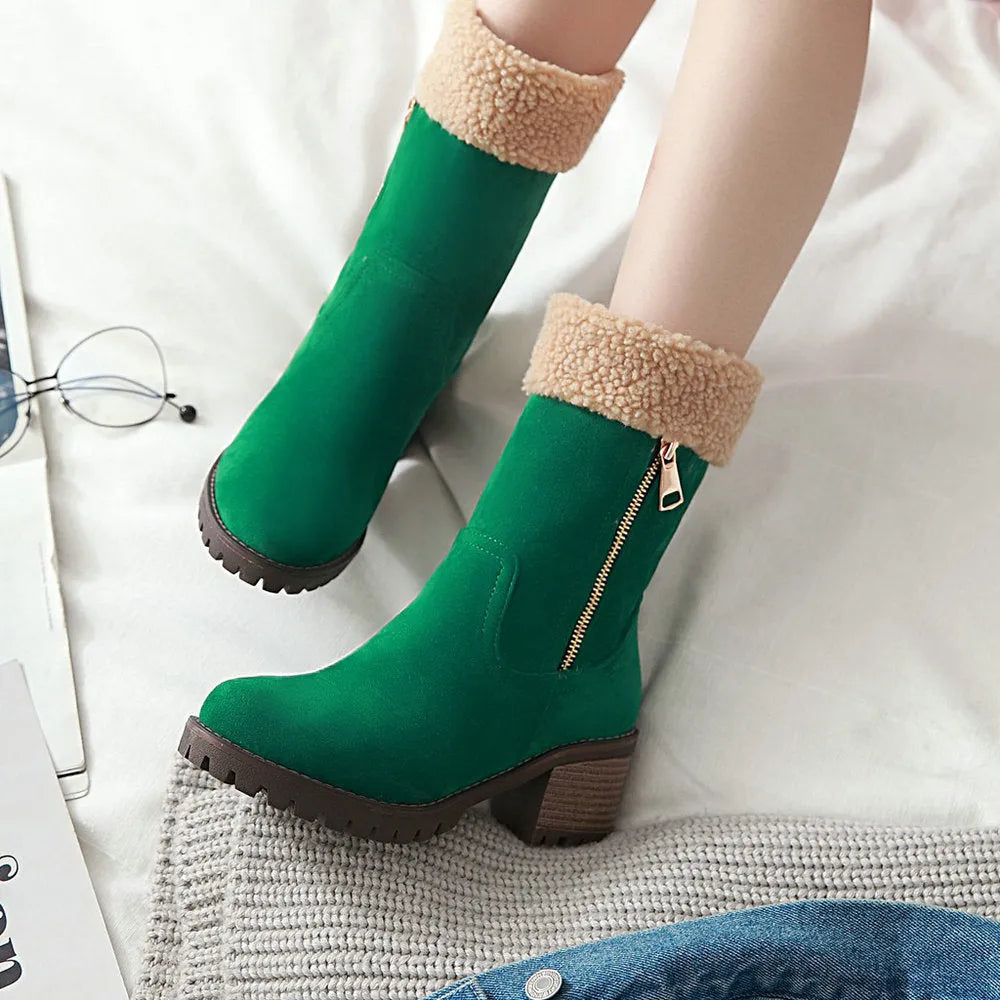A pair of snow boots in black, shown with a soft plush lining and rubber insole.