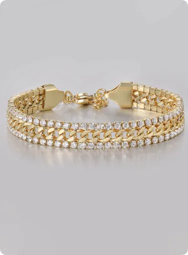 Gold tennis bracelet with gemstone inlay on titanium steel band.