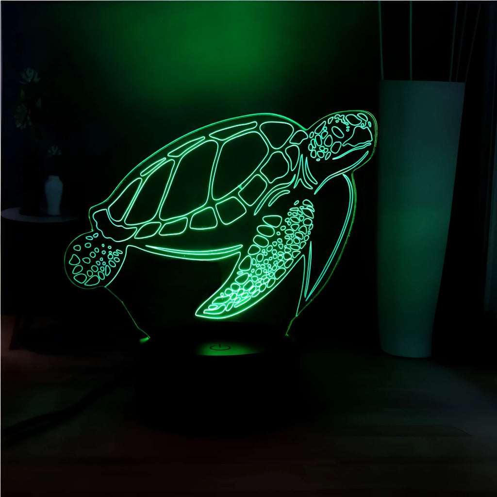 3D acrylic LED turtle night light showing colour-changing glow and remote control
