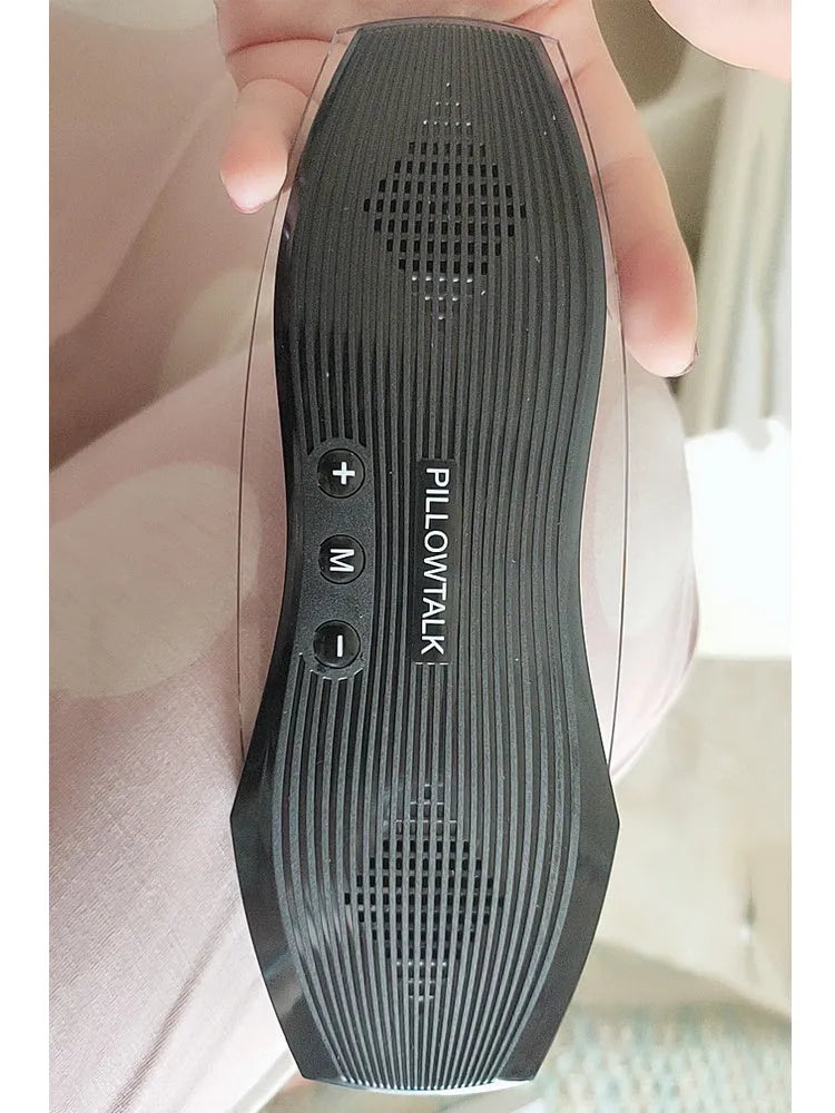 Black true wireless Bluetooth earphones with microphone shown with USB charging cable.
