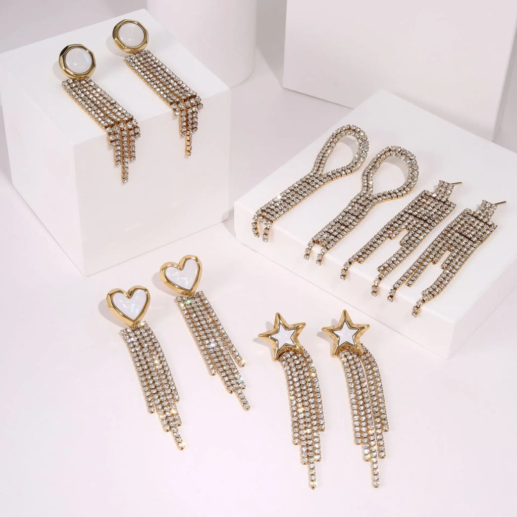 Women's stainless steel earrings with diamond tassel, heart, and star shapes in 18K gold electroplated finish.