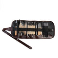 A 27-piece pottery clay tools set with wood, stainless steel, and plastic tools rolled up in packaging.